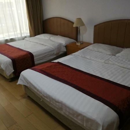 Beijing New World Centre Aparthotel Bagian luar foto