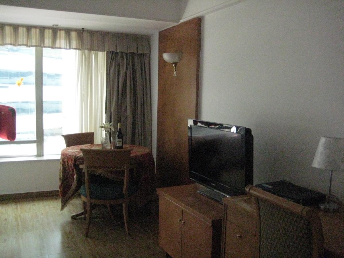 Beijing New World Centre Aparthotel Bagian luar foto